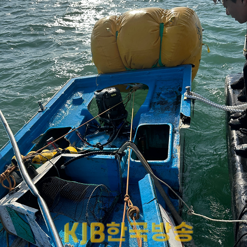 사고 선박에 침몰 방지 조치 중인 여수해경.png
